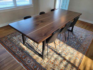 wide board walnut dining table mn